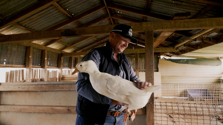 Shaunn Jannusch holding a white duck