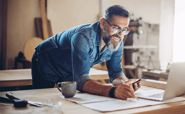Business owner being helped by their broker