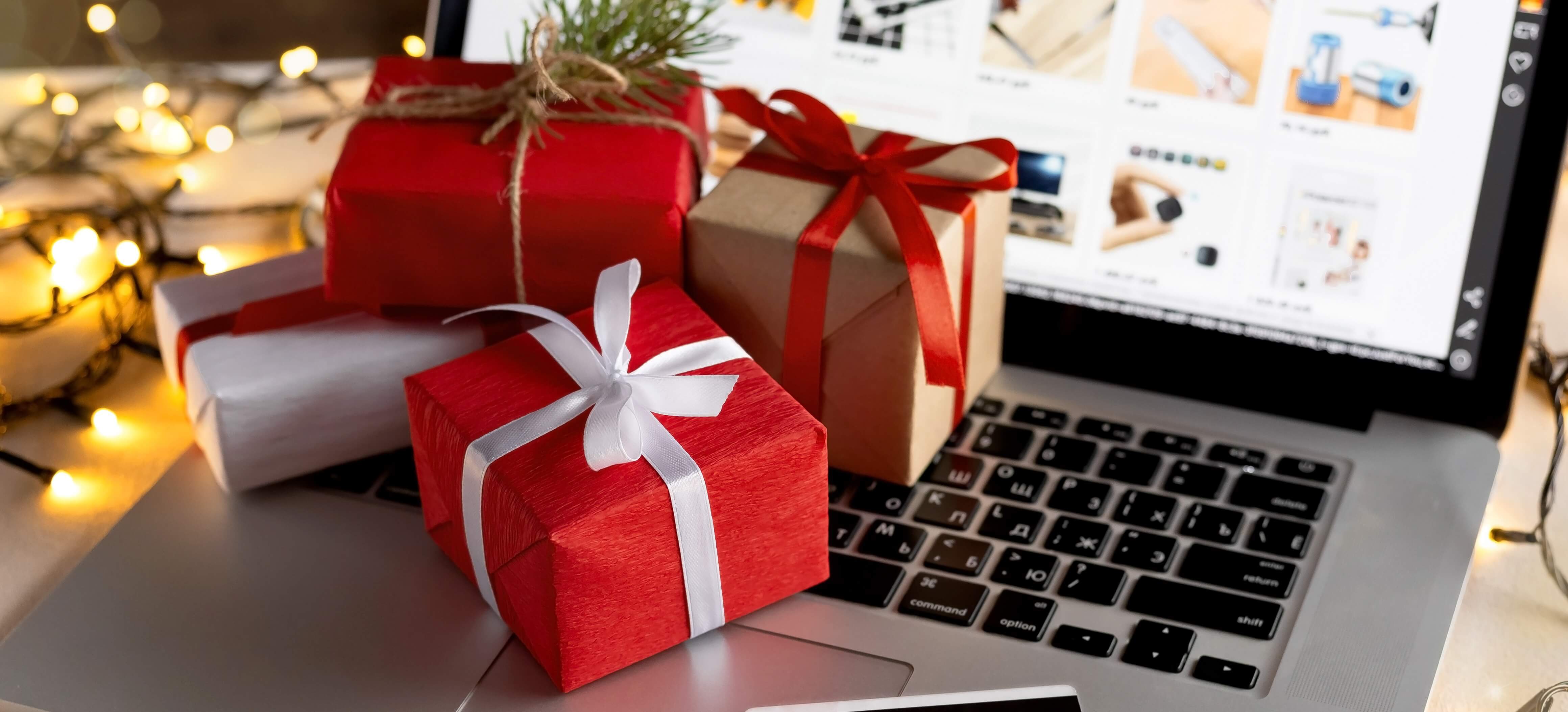 Christmas gifts on laptop computer