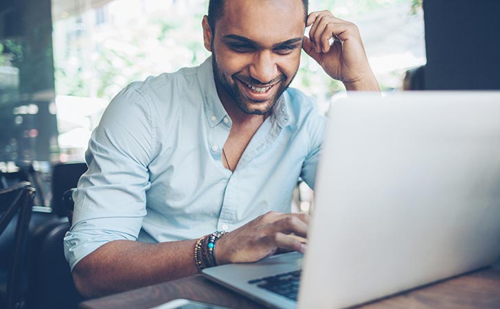 Man learning about foreign currency accounts