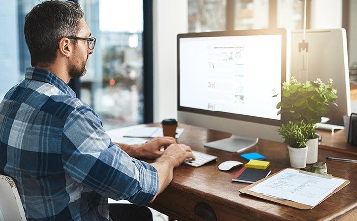 Person learning how to manage a business